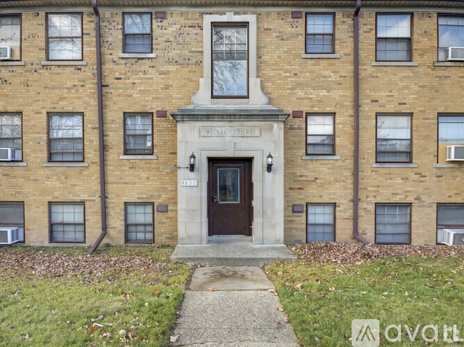 The front of a brick building with the words "Westminster" written on it.