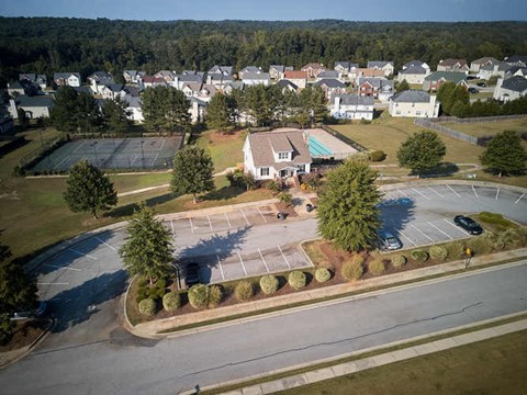 A small town with a large building in the center of the image.