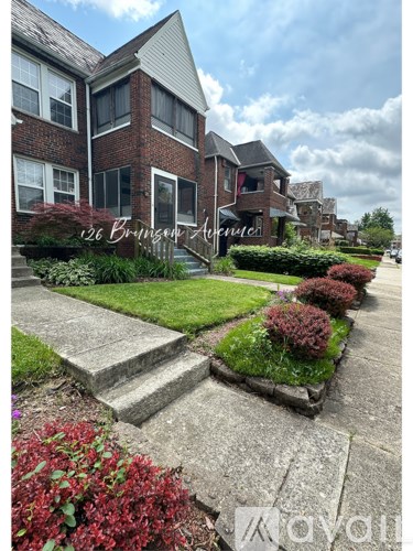 A residential area with a house numbered 126.