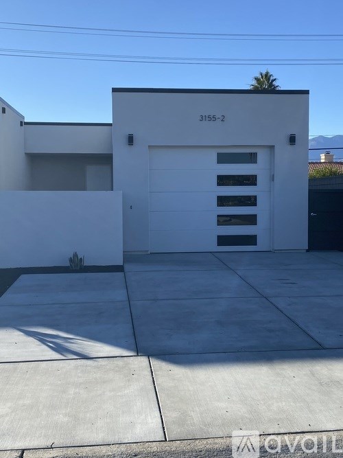 A white building with the number 3155-2 on it.