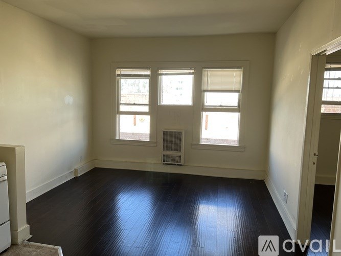 A room with a washer and dryer in it.