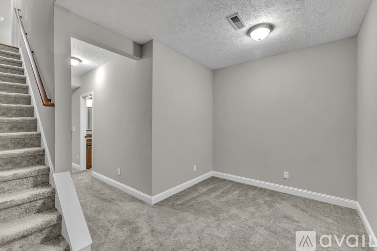 A bathroom with two sinks and a large mirror.