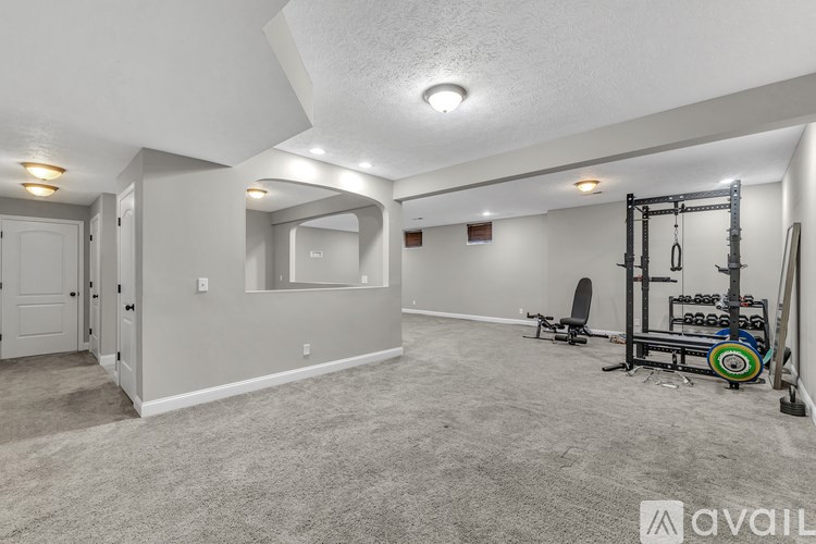A small room with a washer and dryer in it.
