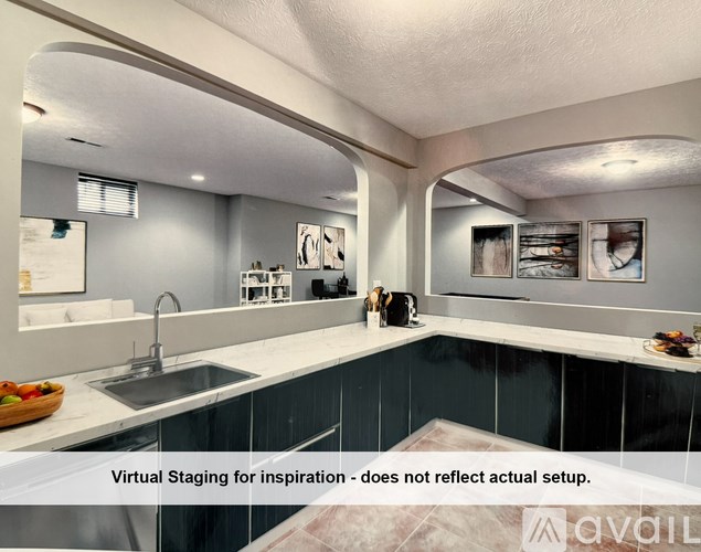 A bathroom with a toilet, sink, and mirror.