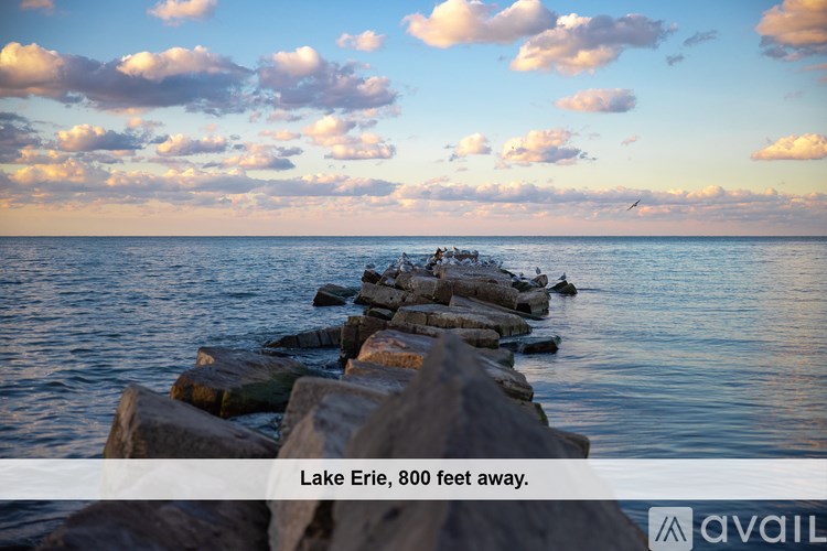 A room with a furnace and a wall-mounted air conditioner unit.