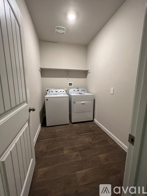 A laundry room with a washer and dryer.