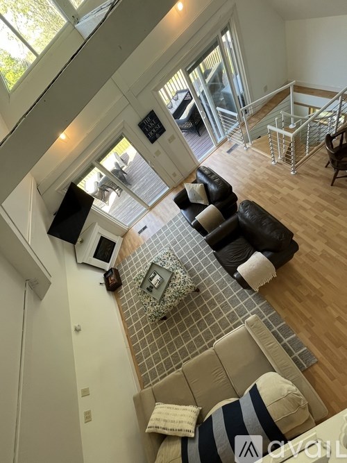 A living room with a couch and a coffee table.