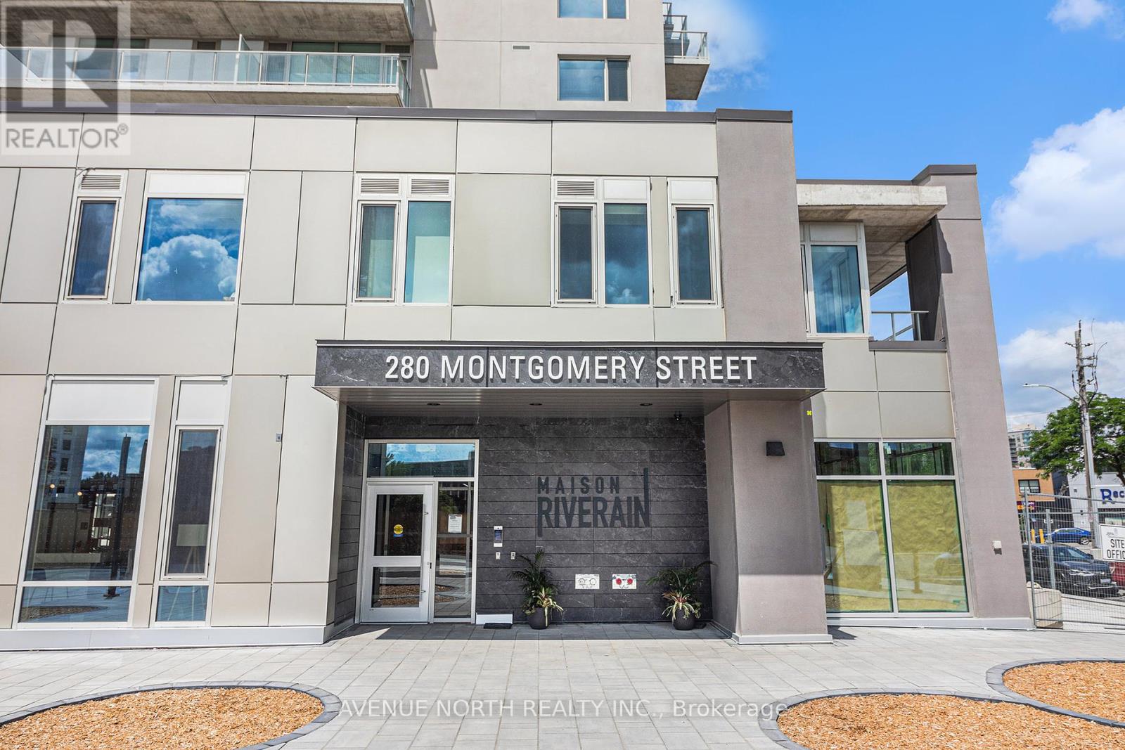 The front of a building with the address 280 Montgomery Street and the name "Mason Riverain" on it.