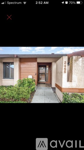 A building with a sign that says "Gate 2" on it.