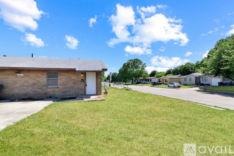 A house with a white door and a window is for sale.