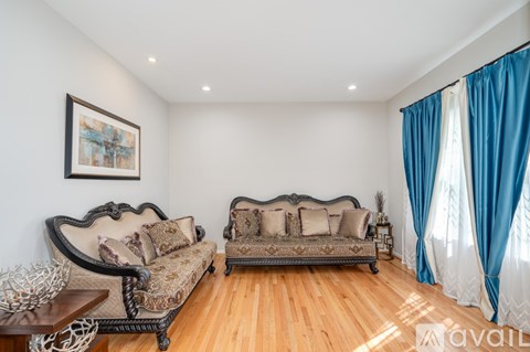 A living room with two sofas and a coffee table.