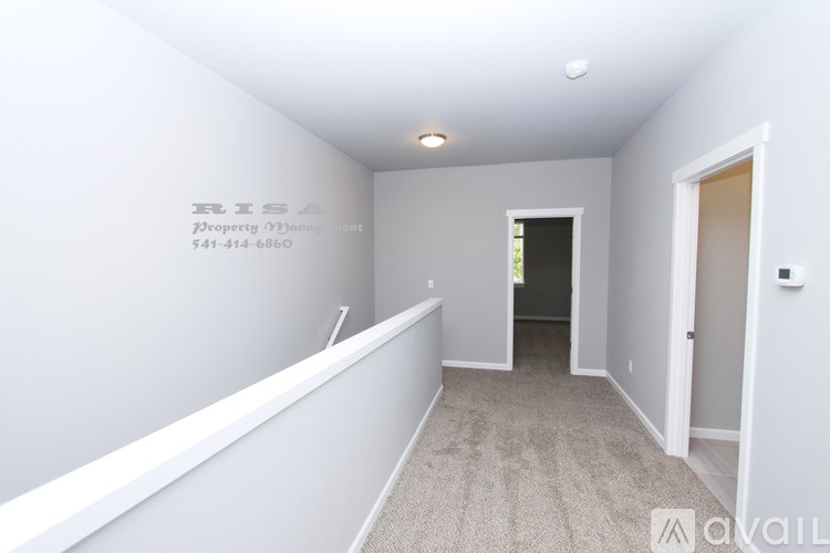 A hallway with a wall that has the word RISA on it.