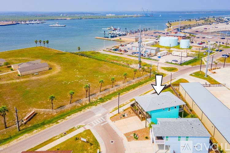 A view of a waterfront area with boats and a dock.