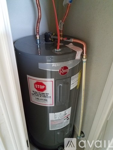 A Pure American water heater with a stop sign on it.