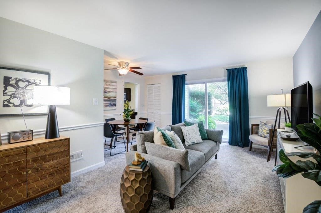 a living room with a couch and a table