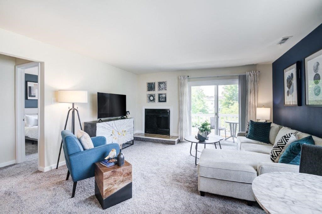 a living room with a couch and a tv