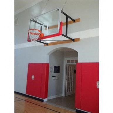 a basketball hoop in a room with red doors