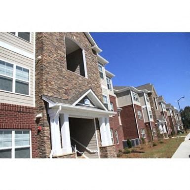 an empty house with the front door open