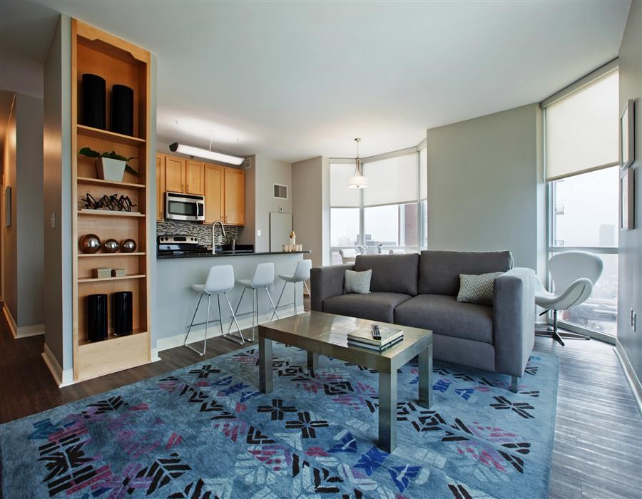 a living room with a couch and a table