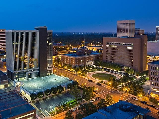 an aerial view of a city at night