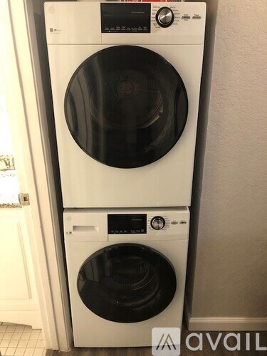 A stacked washer and dryer unit is available for rent.