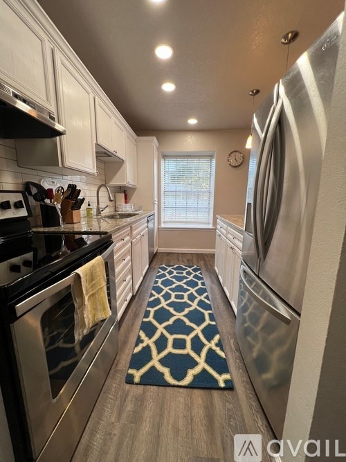 A house with a tree in front of it.