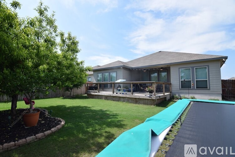 A house with a pool in the backyard.
