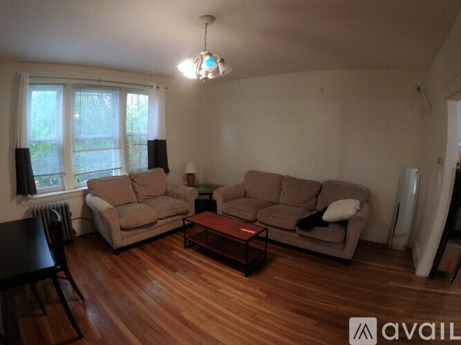A living room with two couches and a coffee table.