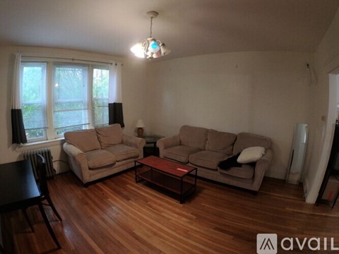 A living room with two couches and a coffee table.