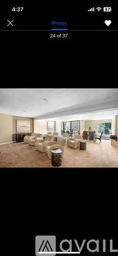 A living room with a couch set and a coffee table.