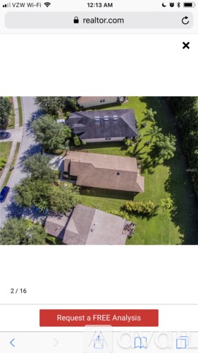 A screenshot of a realtor website with a house image and a button saying "Request a FREE Analysis".