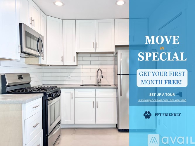 A kitchen with a sign offering a free first month for a move in special.