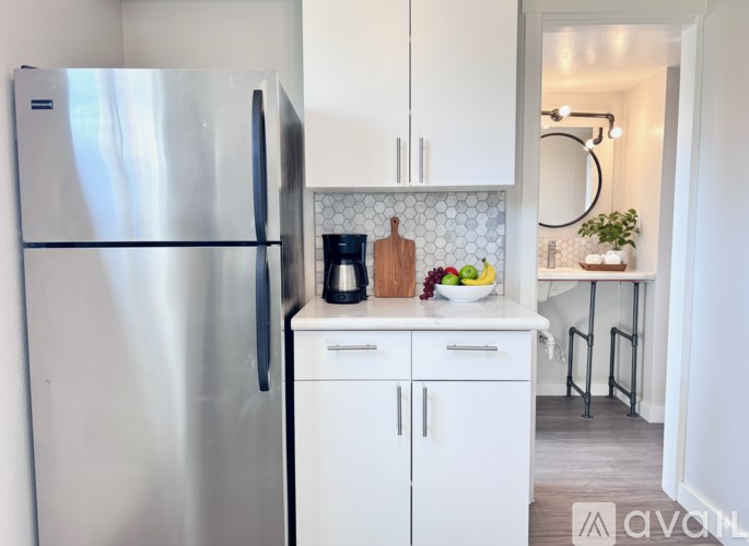 A brick building with a sign that says "45 Lettington" on it.