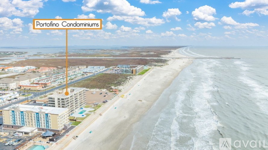 A beachfront sign reads "Portofino Condominiums" with a clear blue sky above.