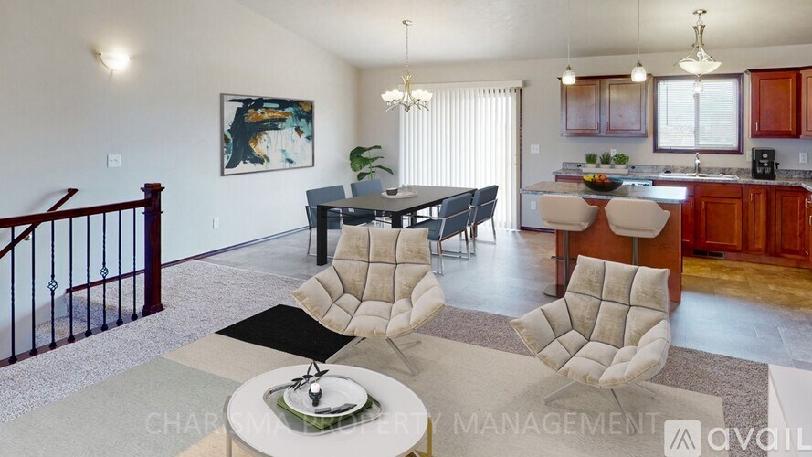 A living room with a dining table and chairs.