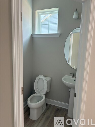 A small bathroom with a toilet and sink.