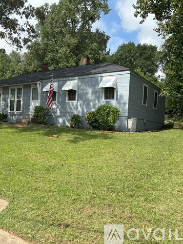 A house with a flag on the front.