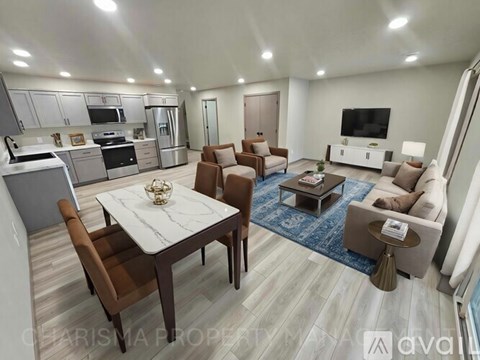 A modern living room with a dining table and chairs.