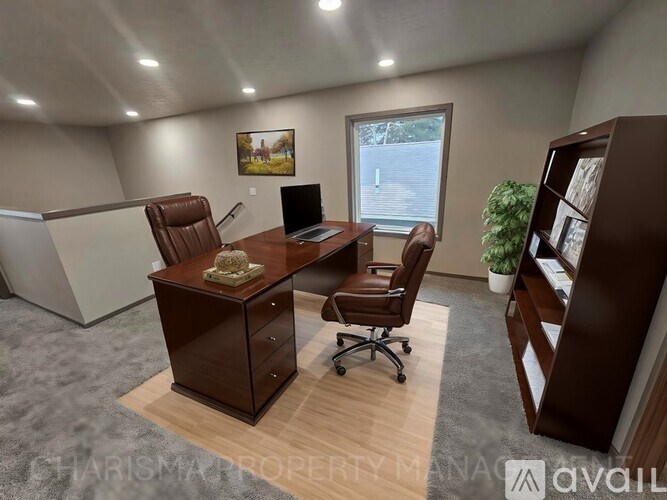 A modern office space with a desk, chair, and a window.