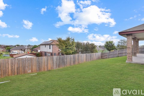 A small, empty room with a light on.