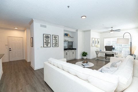 a living room with a couch and a table