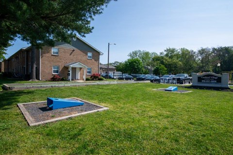 a cemetery in front of a brick building