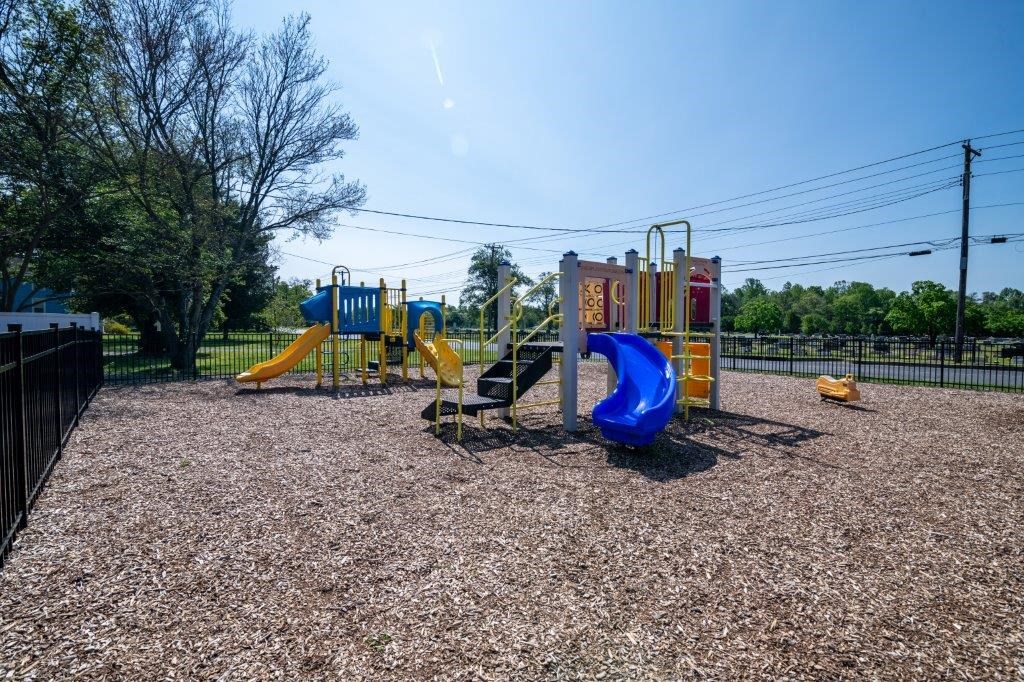 our playground has many toys for kids to play on