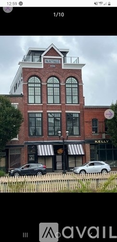 A building with a sign that says "Natalie" on it.