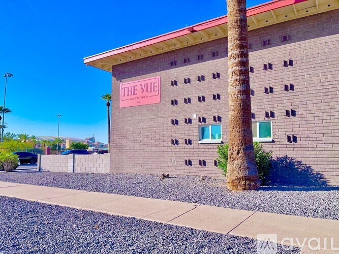 A building with a sign that says "The Vue" on it.