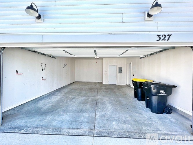 Garage with number 327 on the wall.