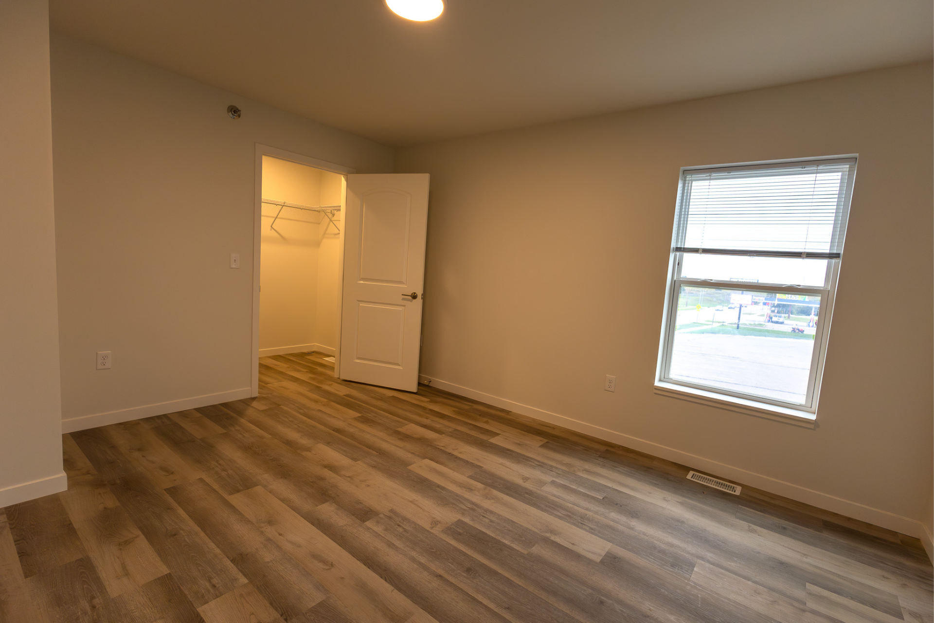 Bedroom with walk-in closet.