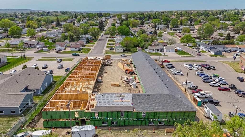 A construction site is in the middle of a residential area.