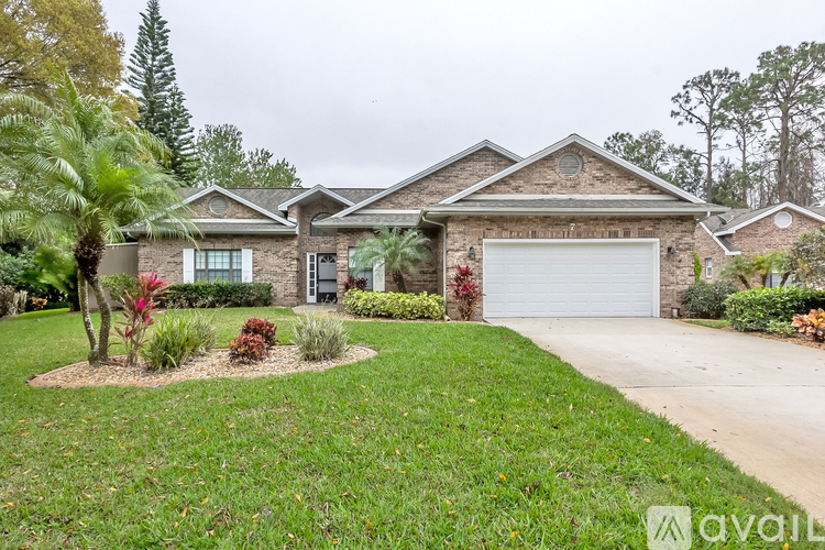 A house with a driveway and a garage.