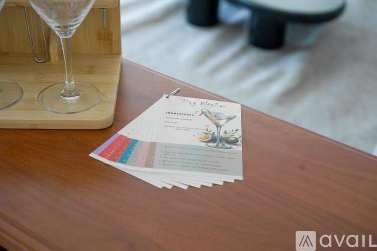 A menu for "Sushi Play" is displayed on a wooden table.